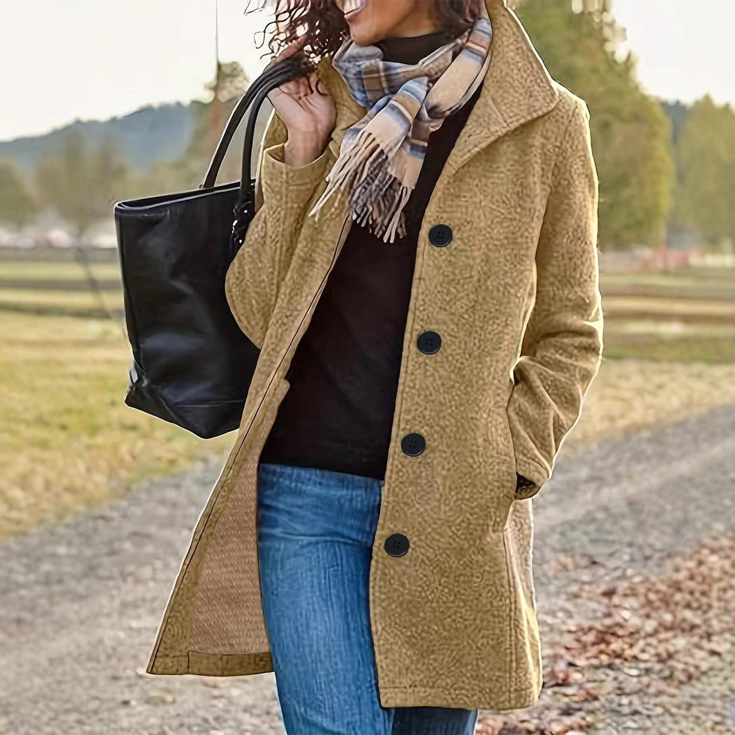 Women's tailored wool blend coat with large button placket and side pockets Mune Fashion
