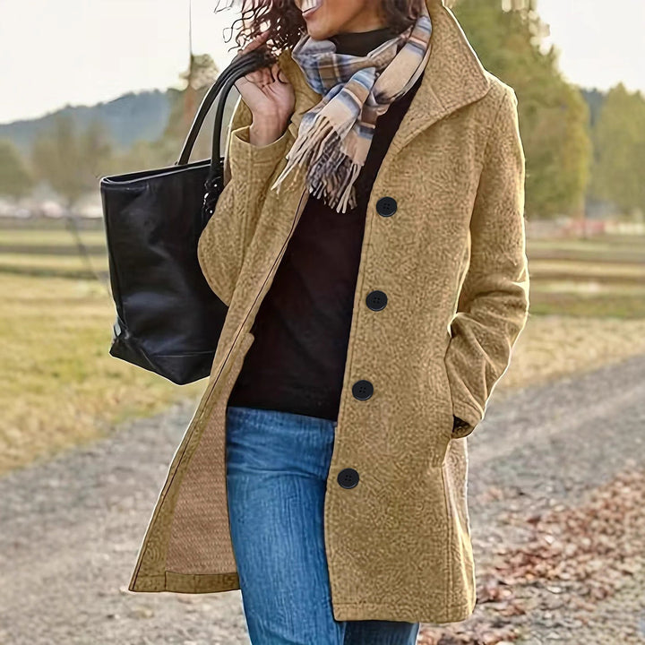 Women's tailored wool blend coat with large button placket and side pockets Mune Fashion