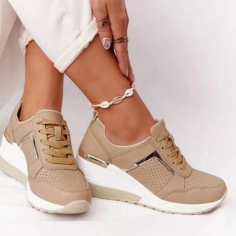 Women's wedge sneakers with perforated upper material, padded comfort collar and reflective metal details Mune Fashion