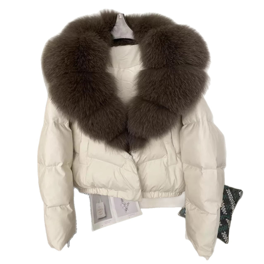 Women's short cut boxy puffer jacket with extra large faux fur collar and shape-stable hem Mune Fashion