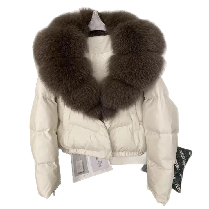 Women's short cut boxy puffer jacket with extra large faux fur collar and shape-stable hem Mune Fashion
