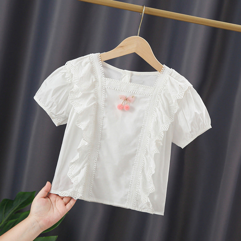 Girls blouse with playful ruffle design and artistic crochet decoration Mune Fashion