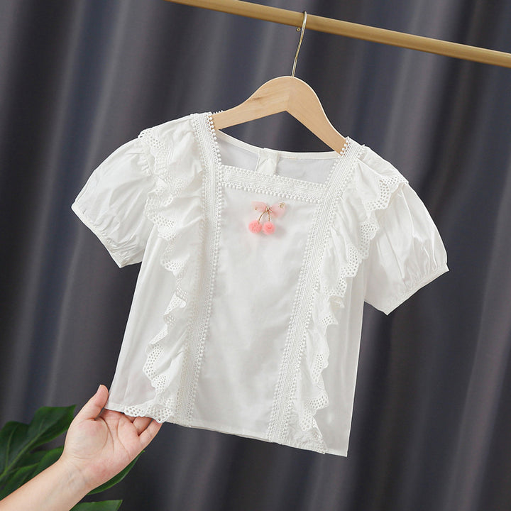 Girls blouse with playful ruffle design and artistic crochet decoration Mune Fashion