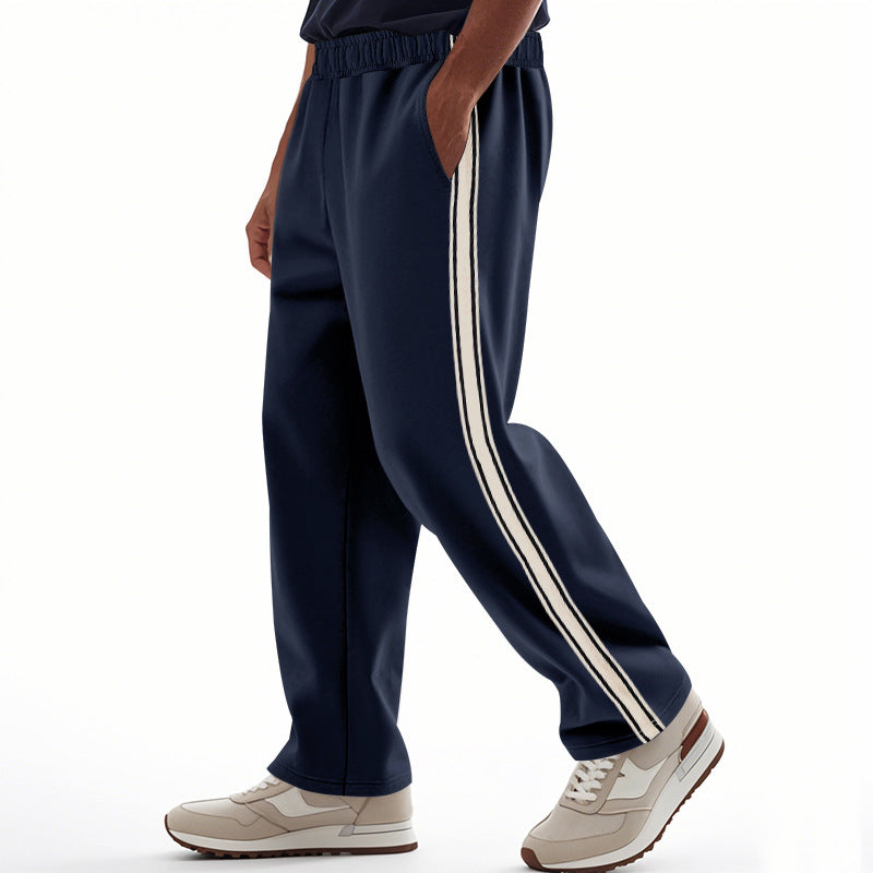 Men's loose Relax track pants in retro style with double side piping and elastic comfort waistband Mune Fashion