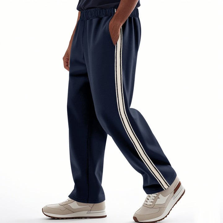 Men's loose Relax track pants in retro style with double side piping and elastic comfort waistband Mune Fashion