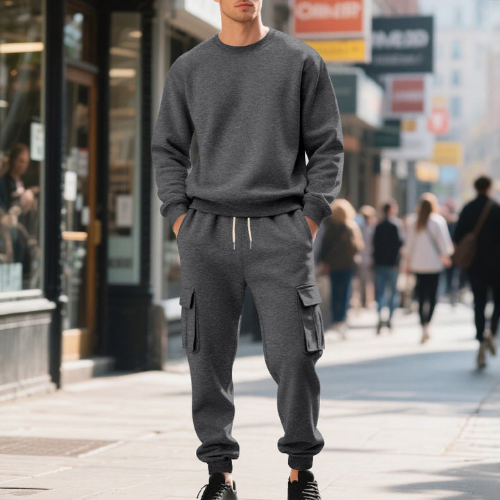 Men's utilitarian cargo jogging pants with large flap and zip pockets, elastic drawstring waistband, and ribbed leg cuffs Mune Fashion