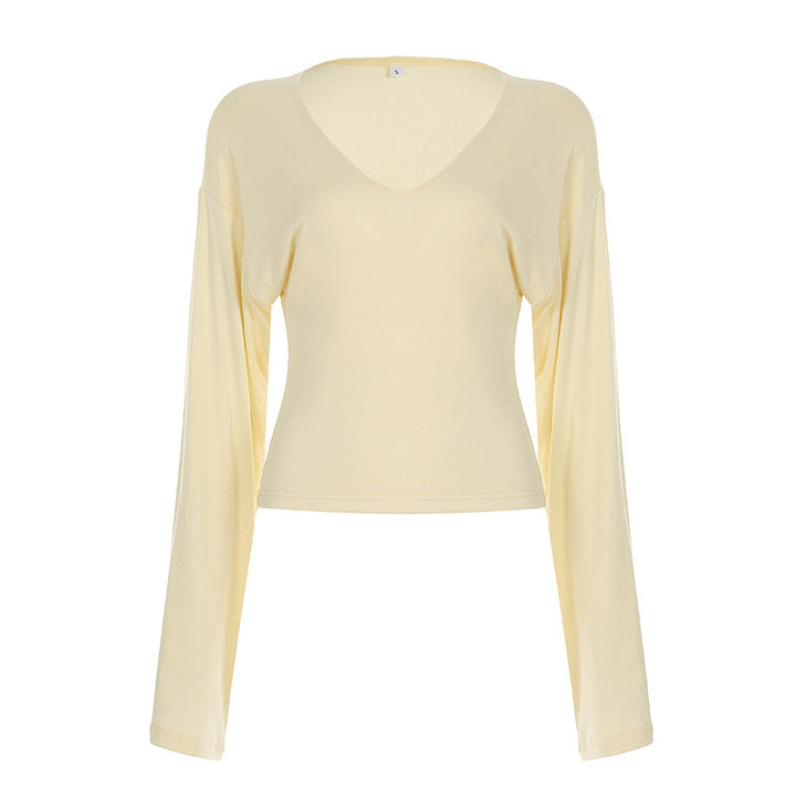 Women's tailored long sleeve cropped shirt with V-neck, dropped shoulder, and soft jersey quality Mune Fashion
