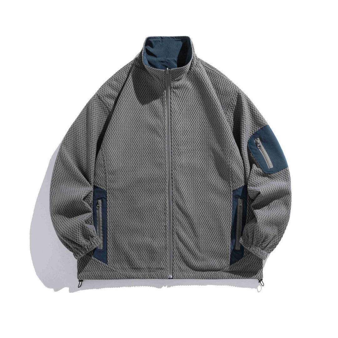 Unisex structure fleece jacket with high stand-up collar, zip pockets and drawstring hem Mune Fashion