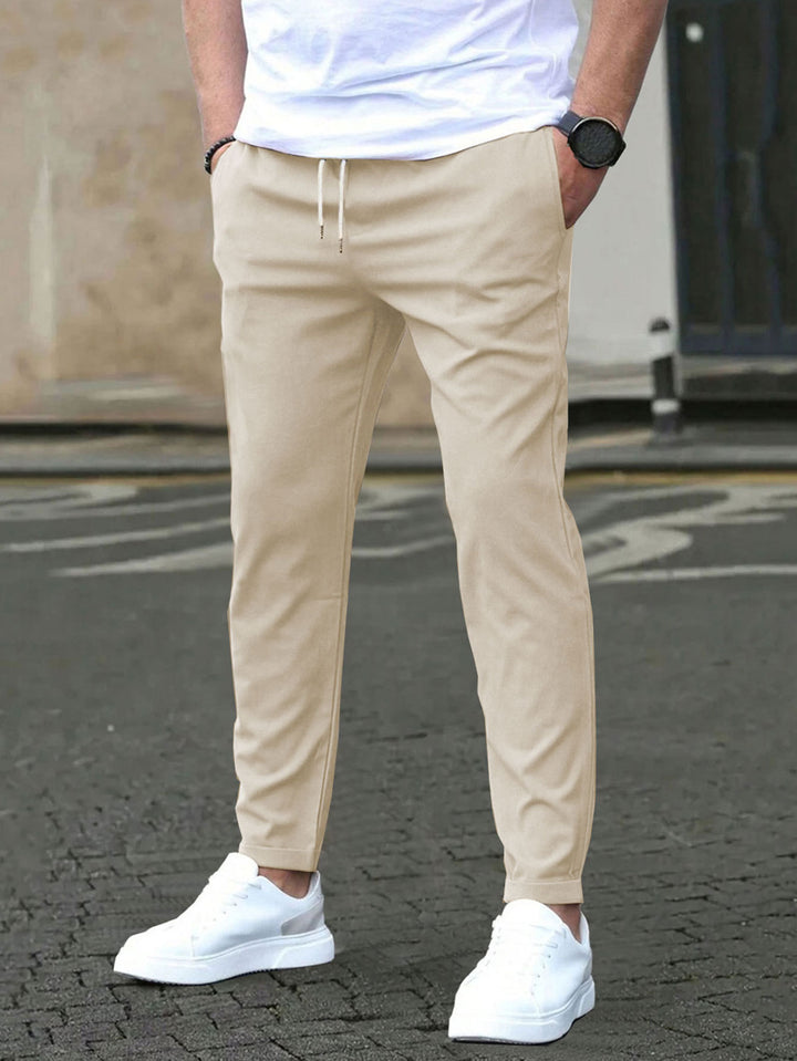 Men's Slim-Fit Jogging Pants with Drawstring, Side Pockets, and Narrow Ankle Hem Mune Fashion