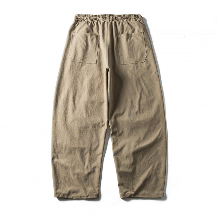 Unisex Wide Cropped Pants with Drawstring, Elastic Waistband and Distinctive Seam Panels Mune Fashion
