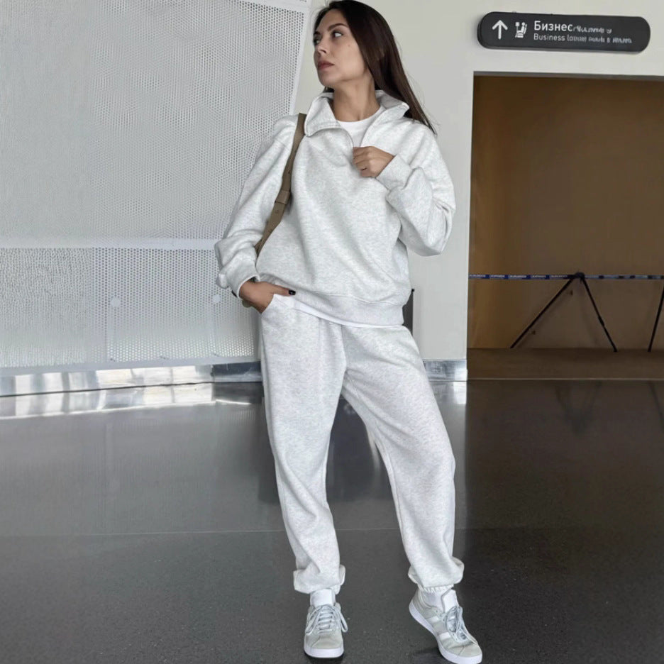 Women's sweat set with half-zip, oversized pullover and high-waisted wide cut jogging pants Mune Fashion