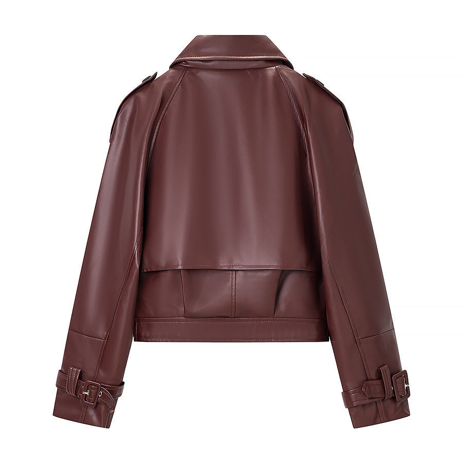 Women short cut biker jacket in leather look with asymmetrical lapel and waist belt Mune Fashion