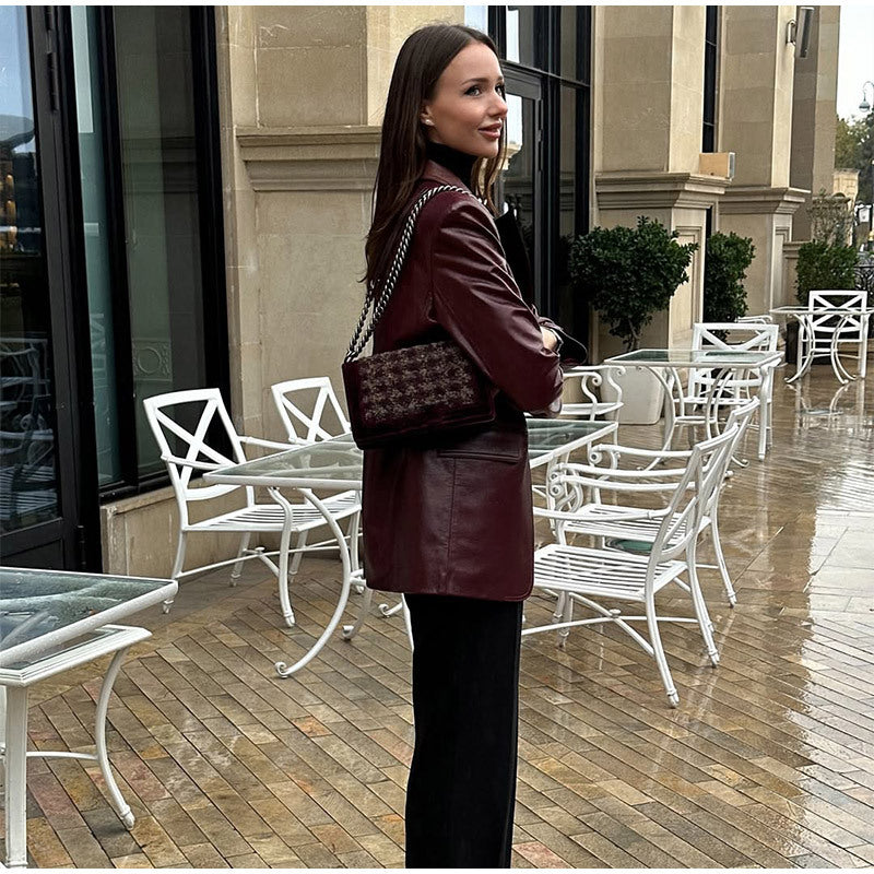 Women's smooth leather blazer with structured shoulder area and extended cut Mune Fashion