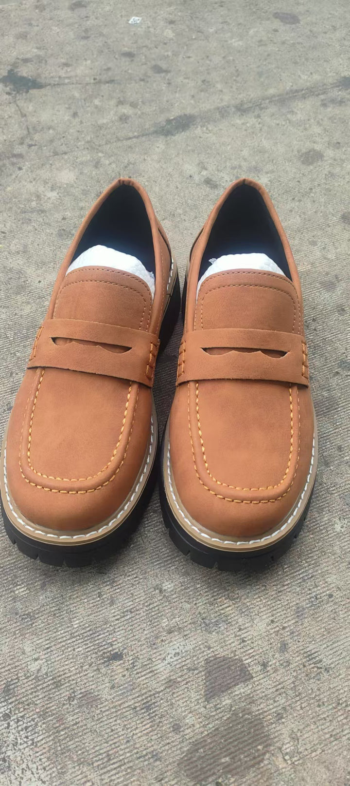 Men's robust penny loafers with distinctive profile sole, handcrafted decorative stitching, and padded comfort footbed Mune Fashion