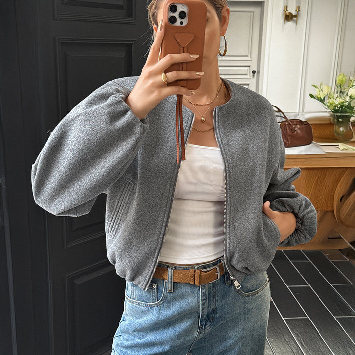 Women's short cozy bomber jacket with continuous zipper, elastic hem, and concealed pockets Mune Fashion