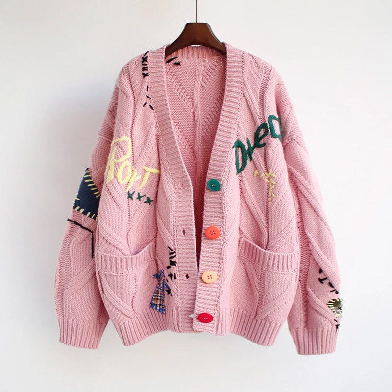 Women's fashionable knitted cardigan with colorful buttons and elaborate details