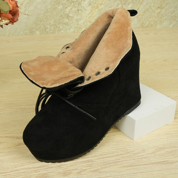 Women's faux fur lined wedge ankle boots with foldable fur collar, lacing and slip-resistant tread sole Mune Fashion
