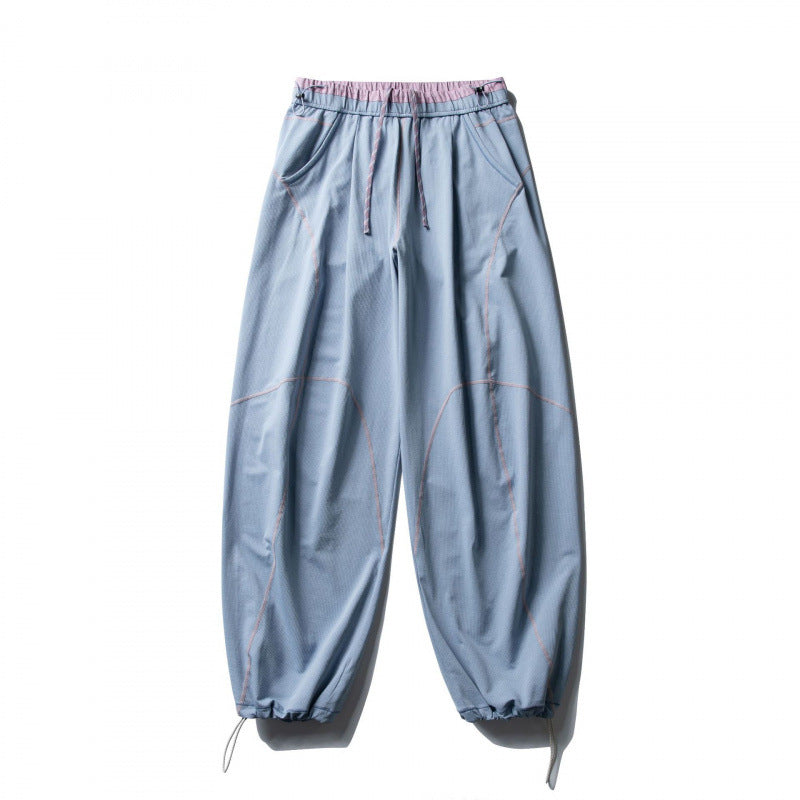 Unisex locker cut tech jogging pants with elastic waistband, distinctive flatlock seams and drawstring Mune Fashion