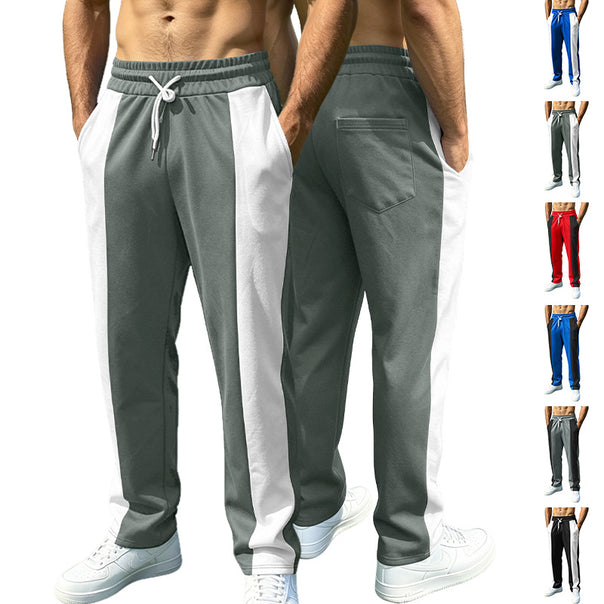 Men's sporty jogging pants with contrasting side inserts, elastic waistband, drawstring, and side pockets Mune Fashion