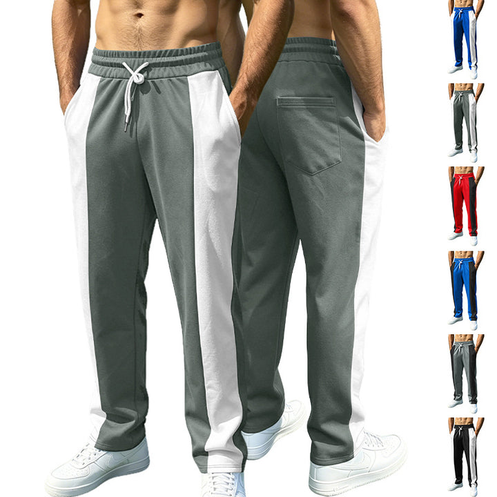 Men's sporty jogging pants with contrasting side inserts, elastic waistband, drawstring, and side pockets Mune Fashion