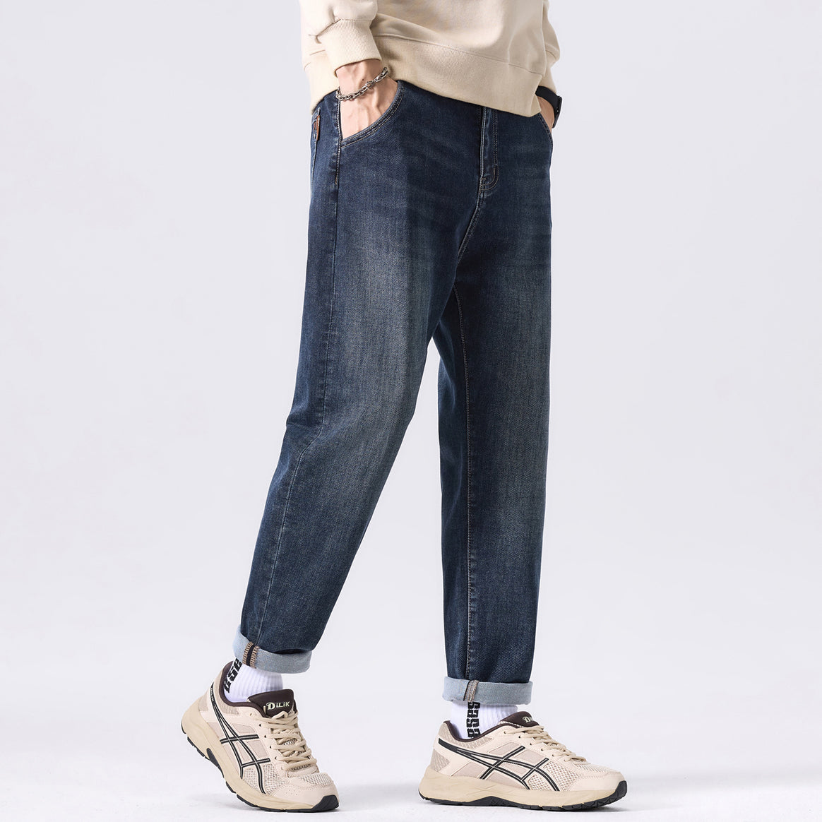 Men's tapered casual jeans with a mid-rise and subtle used wash Mune Fashion