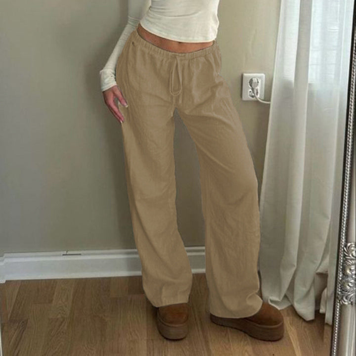 Women's wide jogging pants with high waistband, drawstring and palazzo silhouette Mune Fashion
