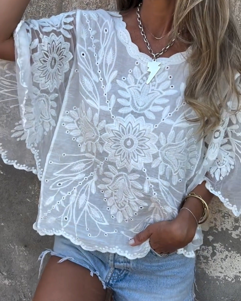 Women's embroidered tunic with ajour embroidery, wavy hem and wide batwing sleeves Mune Fashion