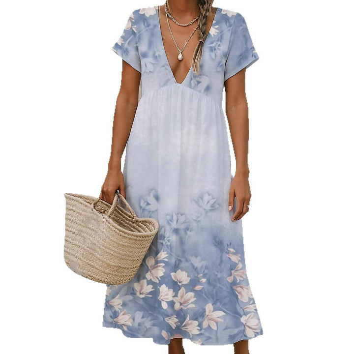 Ladies max dress with deep V-neck and flowing skirt Mune Fashion
