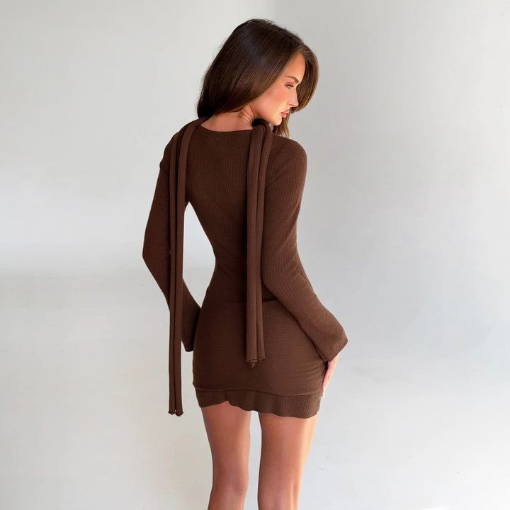 Women’s figure-hugging ribbed knit mini dress with knot detail, integrated loop and neck scarf Mune Fashion