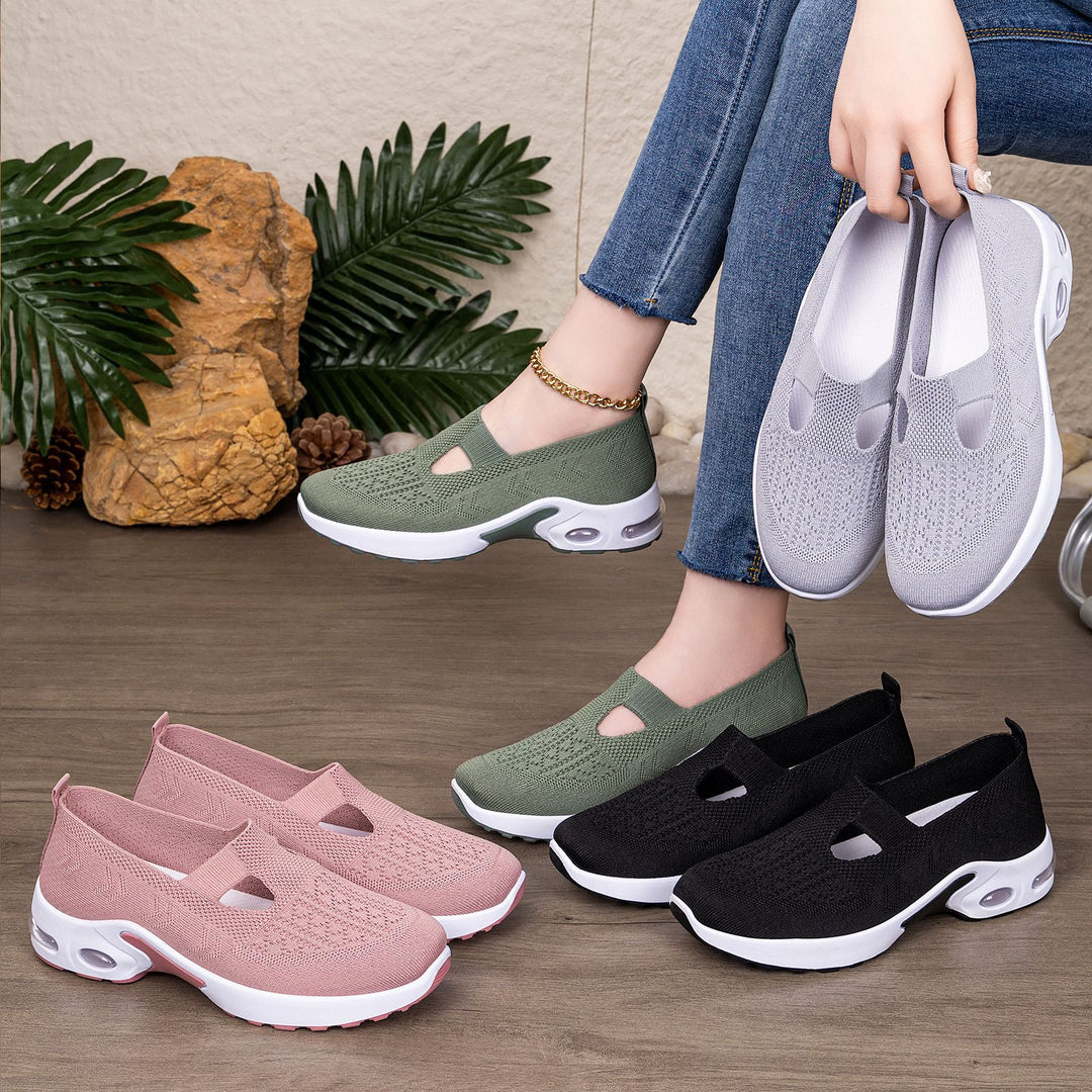 Women’s knitted slip-on sports slipper with elastic entry, cut-out detail, and visible air cushioning Mune Fashion