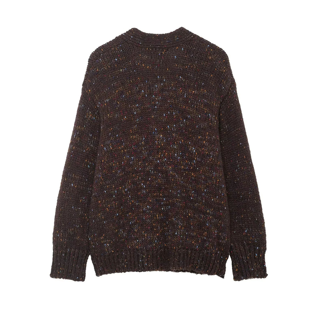 Women’s chunky knit cardigan with horn button front and patch pockets Mune Fashion