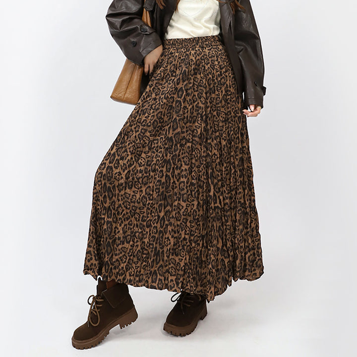 Women's flowing midaxi skirt with asymmetrical wave hem, fine crinkle pleated structure and elastic comfort waistband Mune Fashion