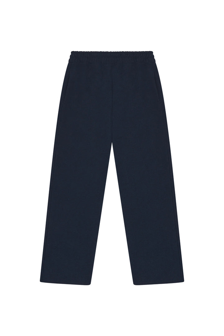 Unisex straight-cut jogging pants with a high elastic waistband and side inset pockets Mune Fashion