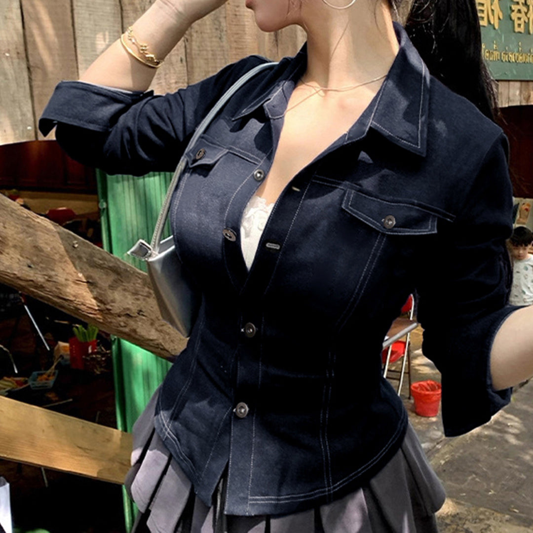 Women's fitted denim jacket with striking contrast seams, chest pockets, and figure-flattering cut Mune Fashion
