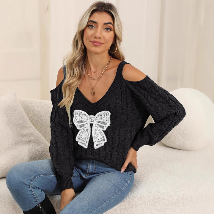 Women's stylish sweater with playfully knitted bow motif Mune Fashion