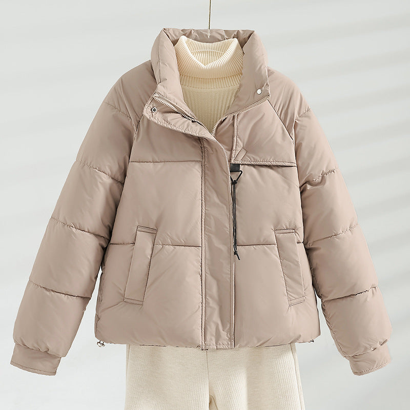 Women's non-short padded boxy jacket with high stand-up collar, drawstring chest closure, and slanted flap pockets Mune Fashion