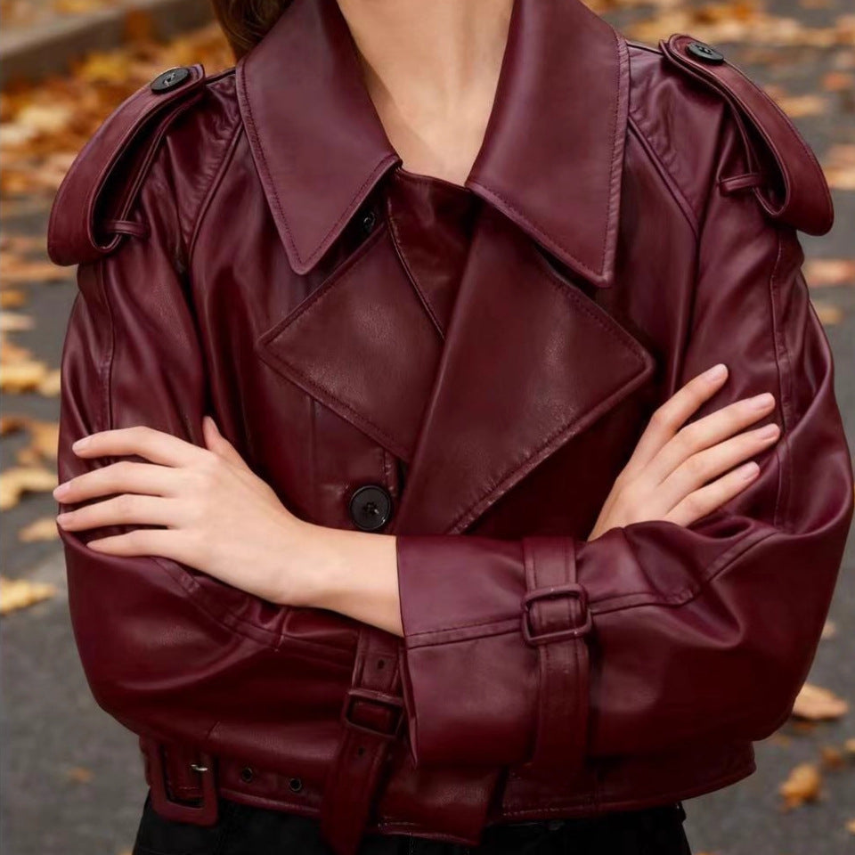 Women's nan cropped faux leather trench coat with shoulder flaps, fitted belt, and adjustable cuffs Mune Fashion
