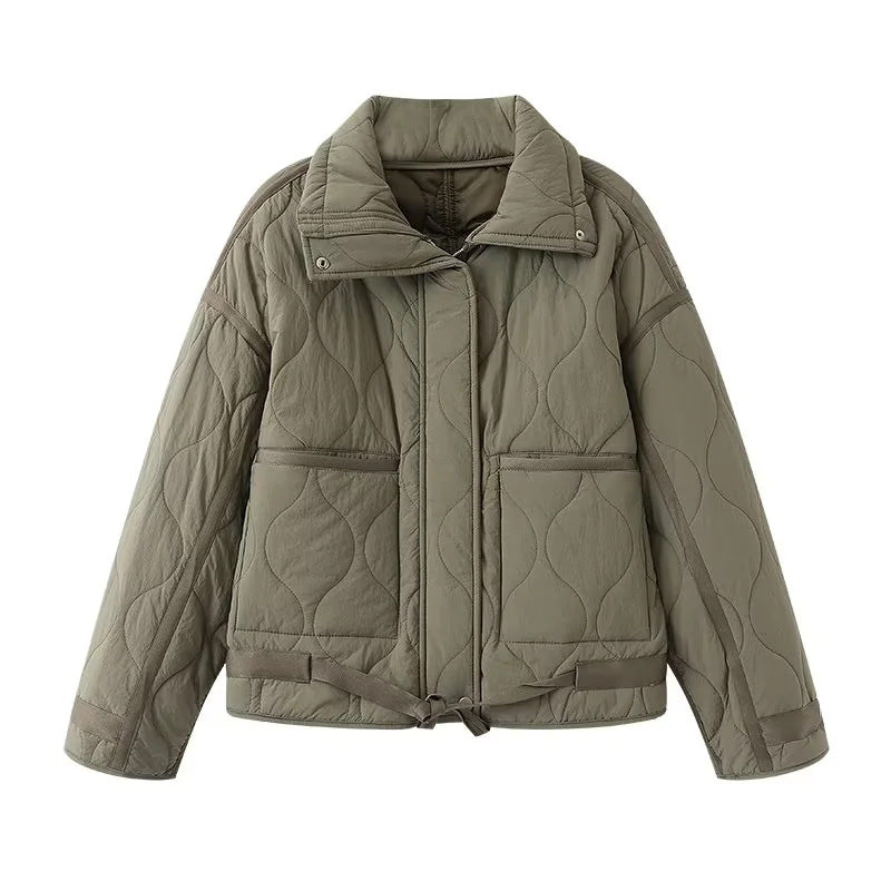 Women's quilted boxy transitional jacket with drawstring hem, stand-up collar, and patch pockets Mune Fashion