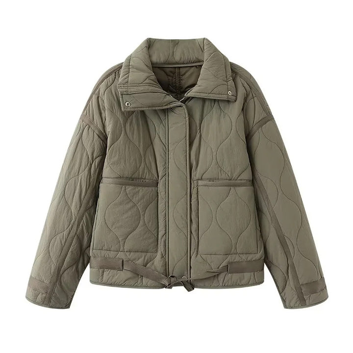 Women's quilted boxy transitional jacket with drawstring hem, stand-up collar, and patch pockets Mune Fashion