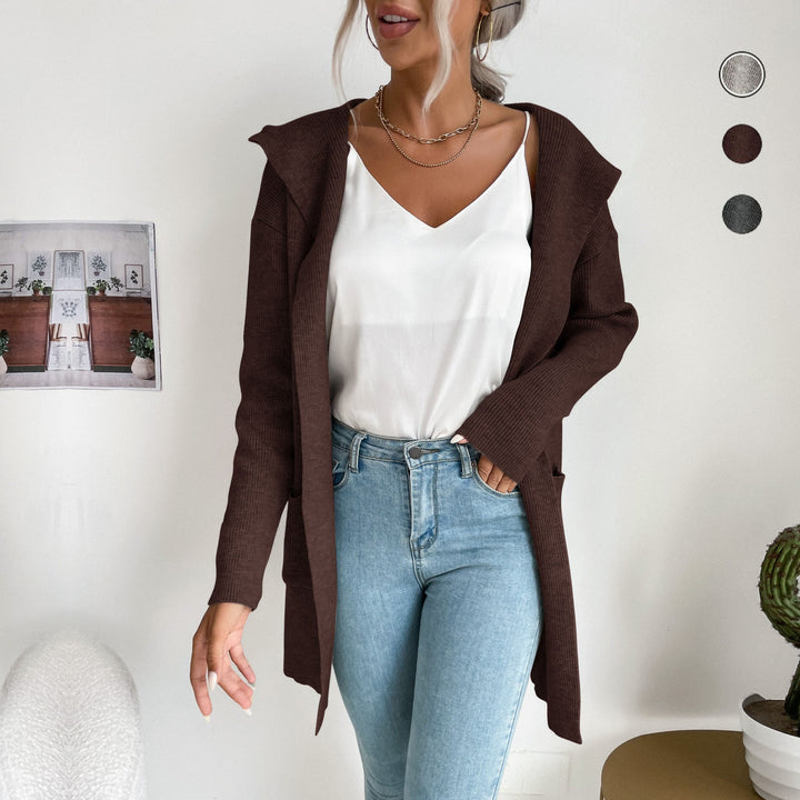 Women's longer ribbed cocoon cardigan made of lightweight fine knit with patch pockets Mune Fashion