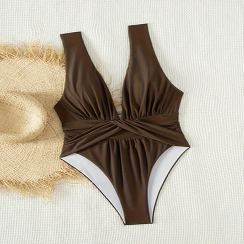 Women's one-piece swimsuit with flowing wrap design and high leg cut Mune Fashion