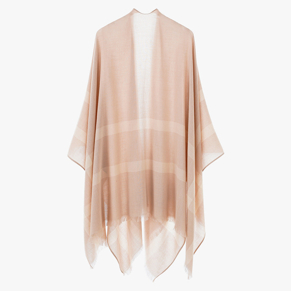 Women’s lightweight fine knit cape with diagonal contrasting stripes and fringes Mune Fashion