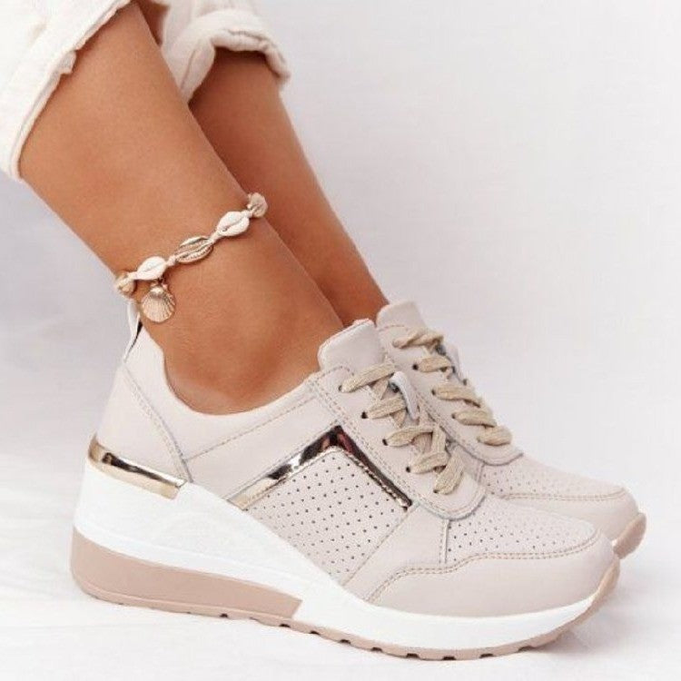 Women's wedge sneakers with perforated upper material, padded comfort collar and reflective metal details Mune Fashion