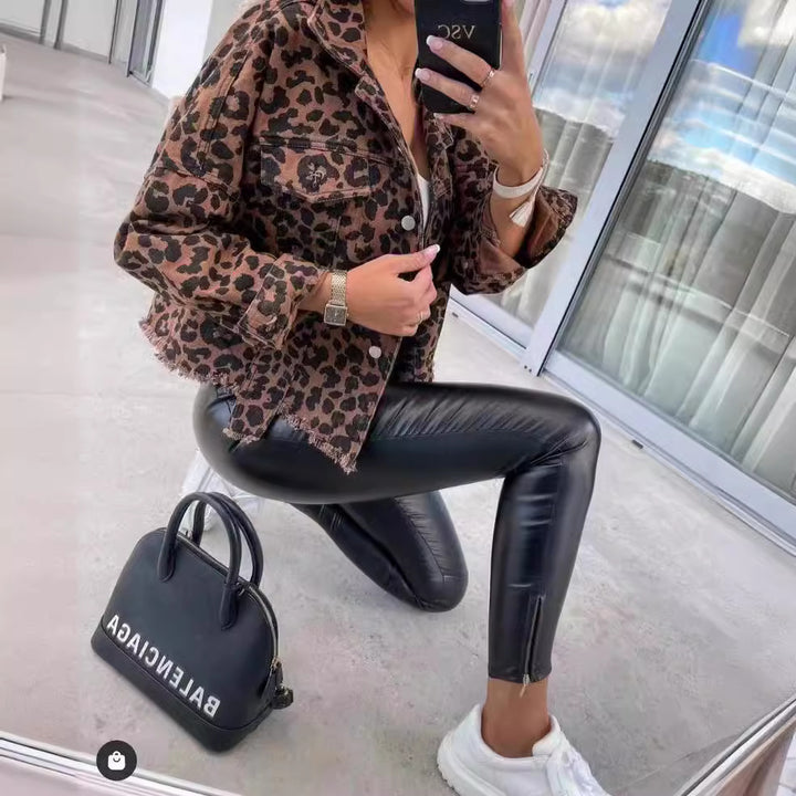 Women's cropped oversized denim jacket with leopard print, patch chest pockets, and raw hem Mune Fashion