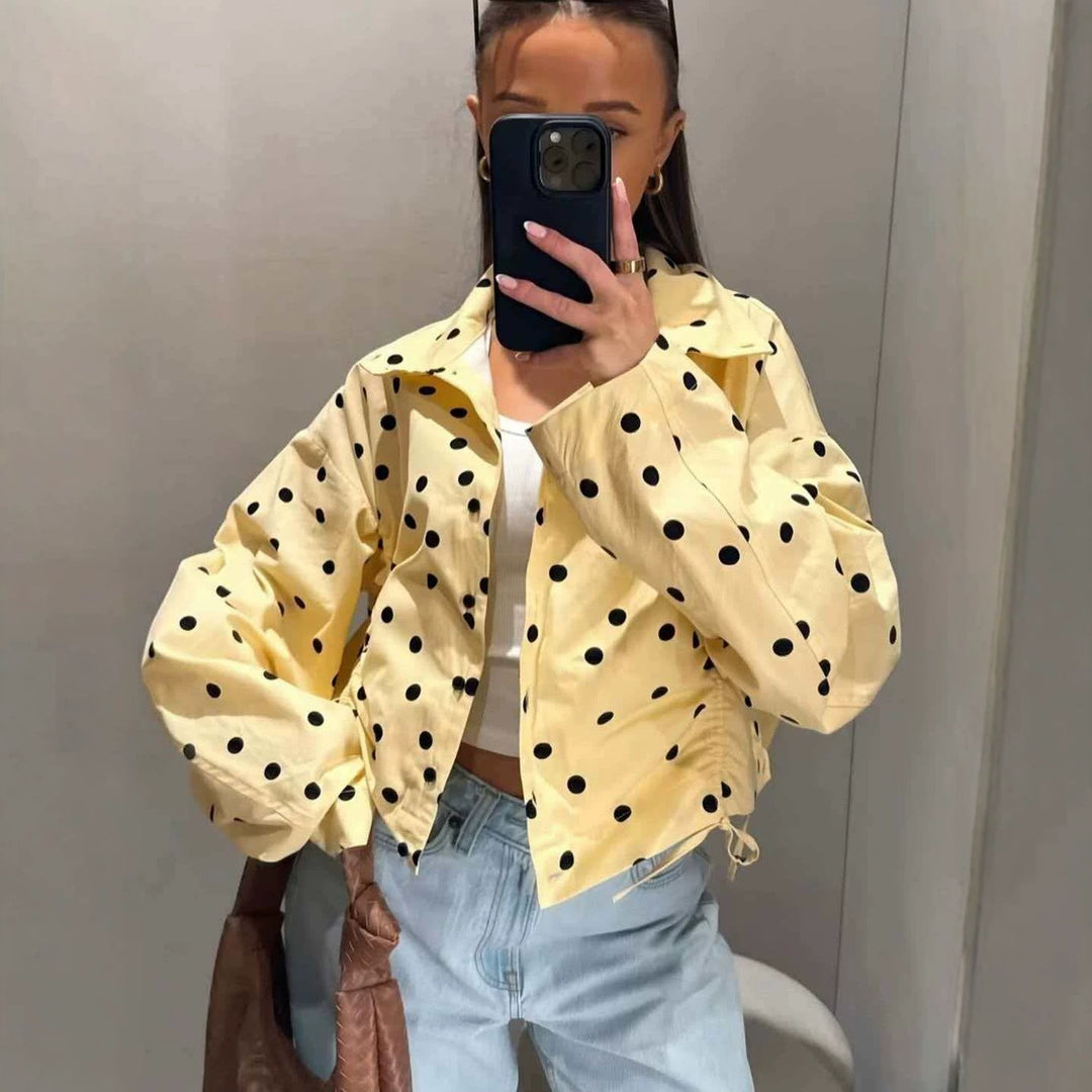 Ladies short cut dotted rain jacket with stand-up collar, snap button placket and drawstring Mune Fashion