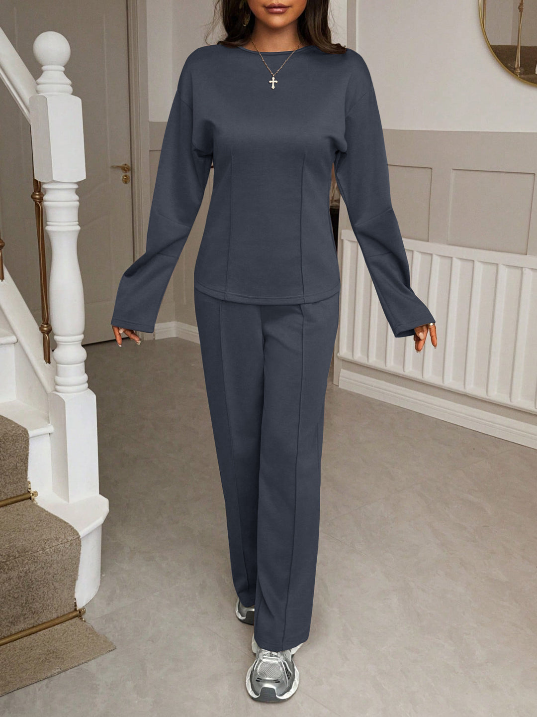 Women's soft lounge set with fitted sweatshirt, sculpting seam details, and wide palazzo pants leg Mune Fashion