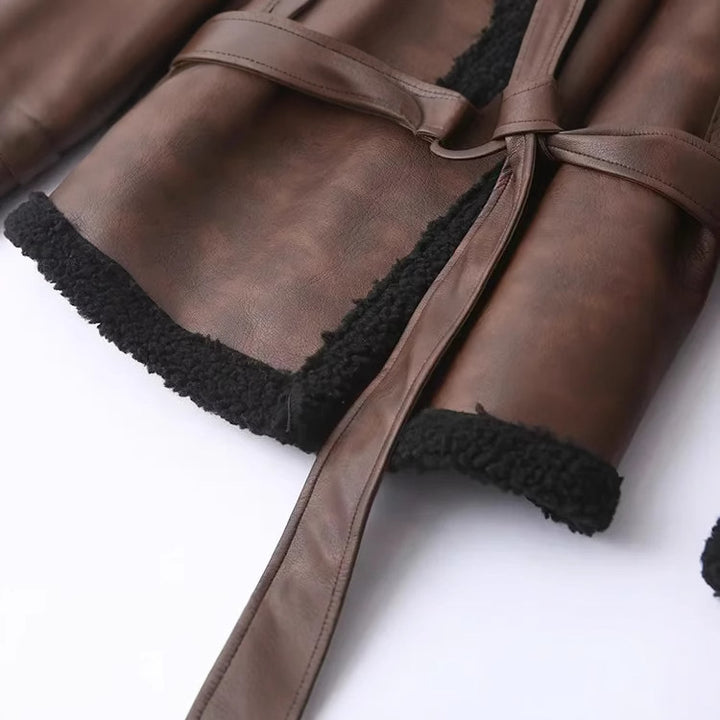 Women's tailored lambskin imitation bomber jacket with tie belt, teddy collar and adjustable cuffs Mune Fashion