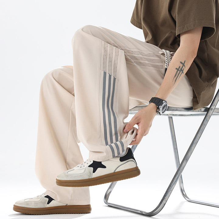 Men's sporty jogging pants with breathable inserts