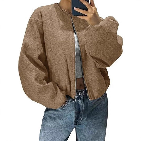 Women's short jacket with continuous zipper, balloon sleeves, and elastic hem Mune Fashion