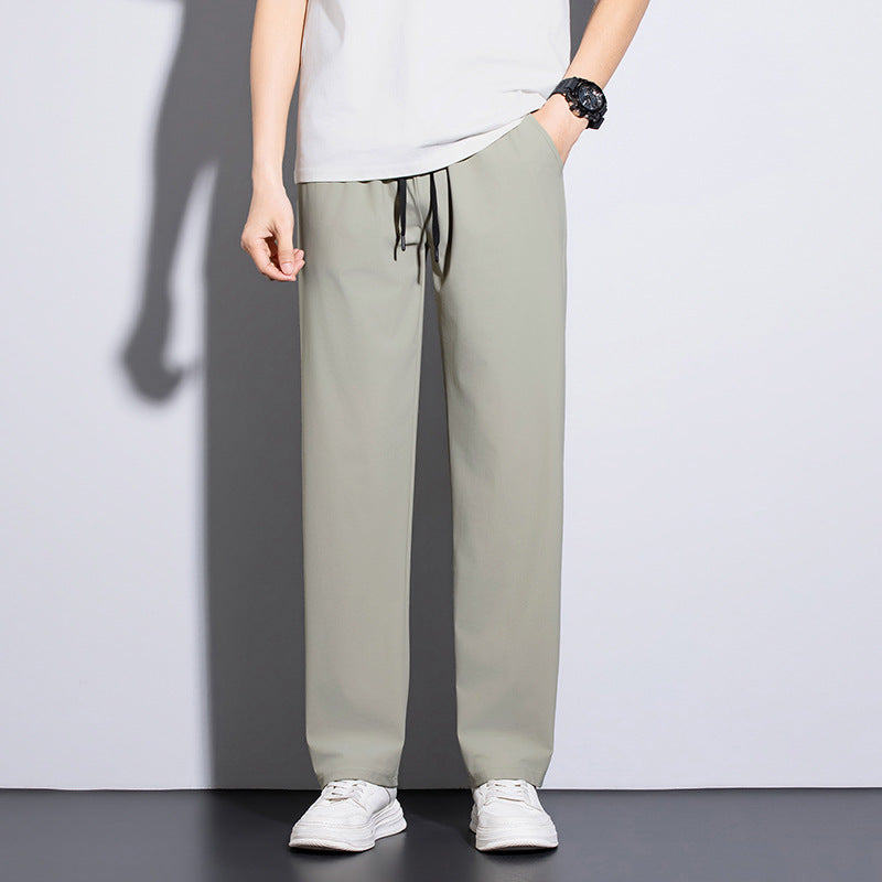 Men's sporty training pants with elastic waistband and practical pockets Mune Fashion